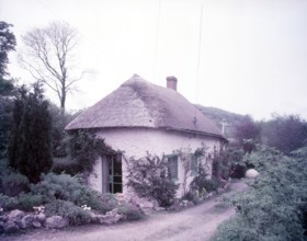 Thatched cottage at Hole Village, near Branscombe, Devon, c1955.  Creator: Arthur Charles Kirby Ware.