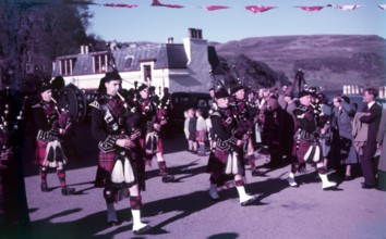 Pipers sounding 'The Retreat', Portree, Isle of Skye, Scotland, c1955. FOCUS? Creator: Arthur Charles Kirby Ware.