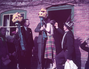 Tutti Men claiming a kiss, Hocktide Festival, Hungerford, Berkshire, c1955. Creator: Arthur Charles Kirby Ware.
