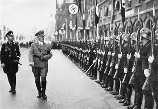 Hitler inspecting his troops on the Royal Square in Munich (1935)