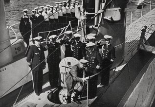 Hitler visiting the first German submarines in Kiel, 1935