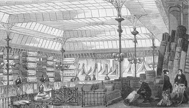 En 1880 à Paris: le comptoir de la literie des magasins du Bon Marché, après de nouveaux travaux