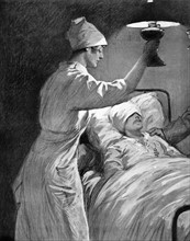 Première Guerre Mondiale - le soin aux blessés - Une infirmière veille sur un blessé par les gaz