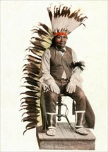 Postcard representing a "modern" Indian chief, the last of the tribe