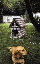 The Dog House made of dog food cans