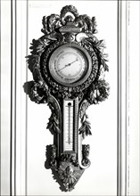 Barometer in sculpted wood