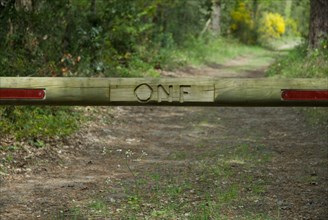 The National Forests Office logo on a barrier