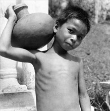 Petit garçon à Phom Pehn, au Cambodge