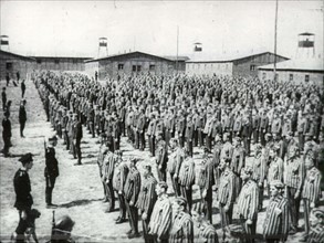 At a Nazi concentration camp, prisoners leaving for hard labour