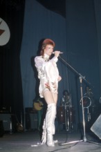 David BOWIE as 'Ziggy Stardust' during a concert, 1972