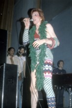 David BOWIE as 'Ziggy Stardust' during a concert, 1972