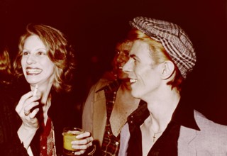 Angie and David BOWIE at a party