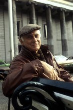 LORIOT with a hat on a bench