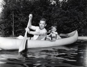 Peter FRANKENFELD with son Thomas in a canoe, 1959