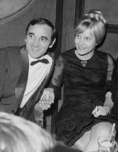 Charles AZNAVOUR with his wife in a Paris nightclub, 1965