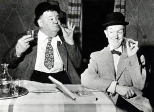 Stan LAUREL and Oliver HARDY with cigars