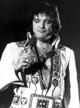 Elvis PRESLEY performing in 1977