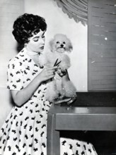Elizabeth TAYLOR with poodle, 1952