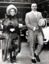 Elizabeth TAYLOR with Richard BURTON leaving Buckingham Palace