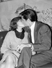 Alain DELON kisses his wife Nathalie CANOVAS, 1965
