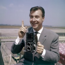 Peter ALEXANDER taking photos