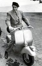 Johannes HEESTERS on a Vespa
