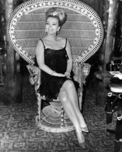 Zsa Zsa GABOR in the wicker chair at a press conference in 1964