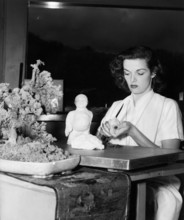 Jane RUSSELL makes a clay sculpture, undated