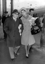 Carlo PONTI and Sophia LOREN arriving in Paris, 1964