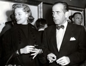 Lauren BACALL and Humphrey BOGART wrestling