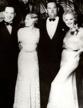 Stan LAUREL and Oliver HARDY with two women