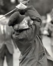 Rita HAYWORTH playing golf