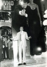 Roger MOORE in front of a 'James Bond' cinema poster, Cannes 1977