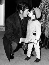 Roger MOORE with his fiancée's son, London 1969