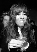 Jane FONDA, portrait with champagne glass