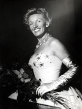 Lale ANDERSEN in evening dress with bouquet of flowers