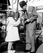 Frank SINATRA gives an autograph