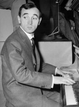 Charles AZNAVOUR playing piano, ca. 1965