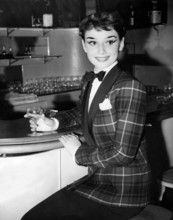 Audrey HEPBURN at a bar, London 1950