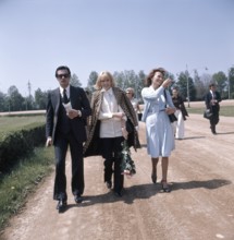 Alain DELON and Mireille DARC in Daglfing