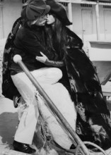 Klaus Kinski with his wife Min Hoi on the beach in 1971