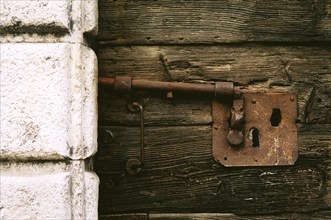 Venice: detail of an old door handle.
