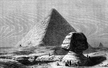Le Sphinx et une des grandes pyramides de Gizeh