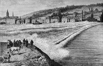 Tidal bore on the Seine river in Paris, France