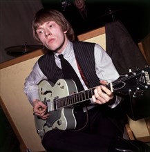 ROLLING STONES - Brian Jones in a Bond Street sound studio recording the backing tracks for  Sympathy For The Devil film