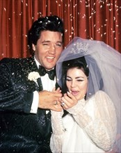 ELVIS PRESLEY marries Priscilla at the Aladdin Hotel in Las Vegas on 1 May 1967