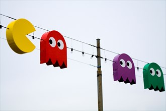 Swiss Christmas lights in shape of Pac Man / Pac Men / Pacman video game characters, by Lac / Lake Geneve. Geneva. Switzerland.