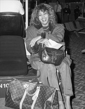 Rock and roll singer and musician Tina Turner leaving London's Heathrow Airport in January 1989.