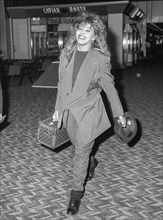 Rock and roll singer and musician Tina Turner leaving London's Heathrow Airport in November 1988.
