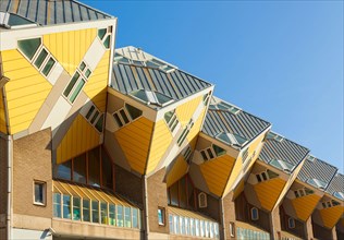 Rotterdam, The Netherlands - October 23, 2011: Yellow Cubic Houses or Kubuswoningen designed by architect Piet Blom in 1977